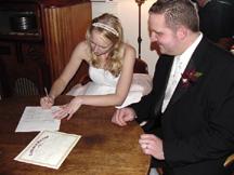 Stephanie signs documents